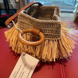 Mimi Tokyta wristlet bag